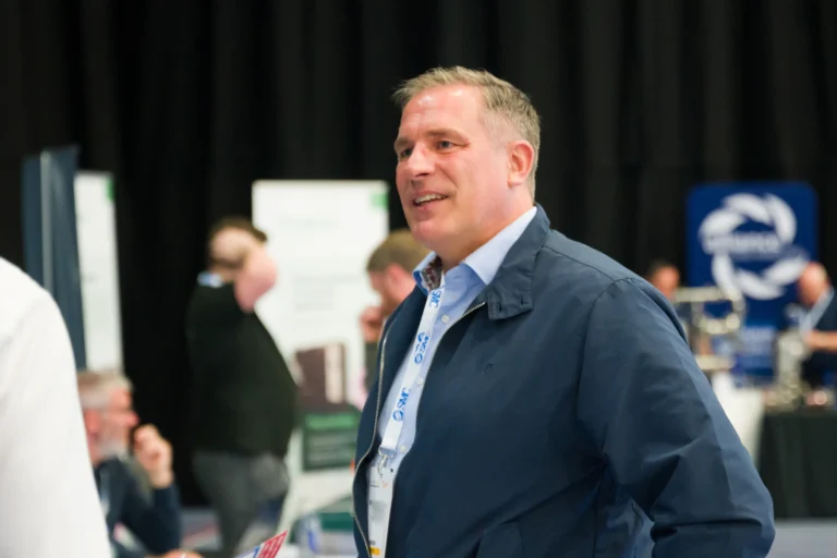 Delegate talking on the exhibition floor at the 2026 Sustainable Food Factory and Food+Beverage Engineering event.
