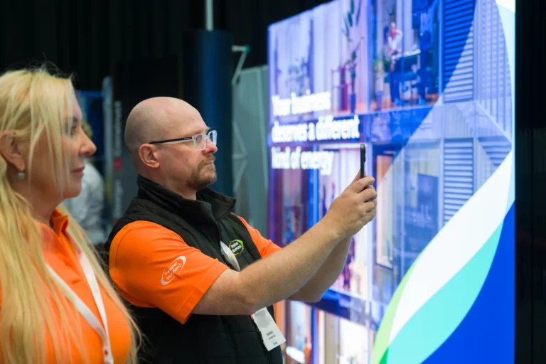 Exhibitor showing a display to a visitor at the 2026 Sustainable Food Factory and Food+Beverage Engineering event.