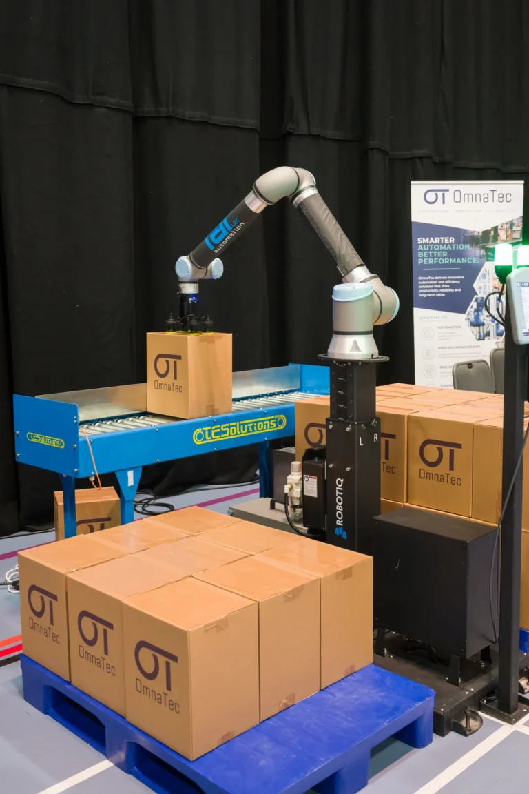 Robotic arm and equipment on an exhibition stand at the 2026 Sustainable Food Factory and Food+Beverage Engineering event.